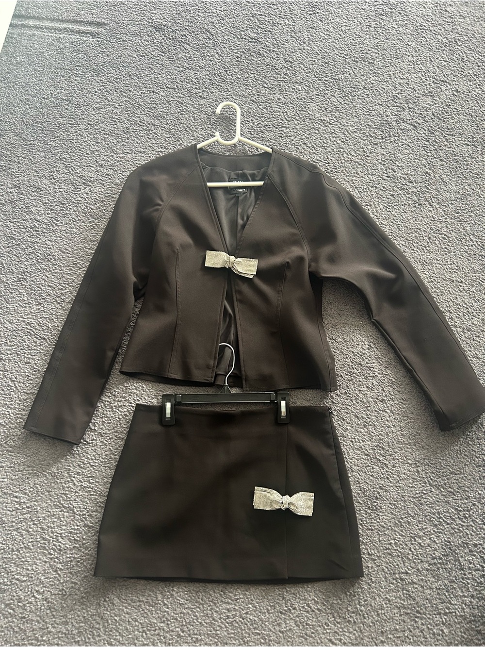 Zara Black Jacket and Skirt Set with Silver Bow Accents